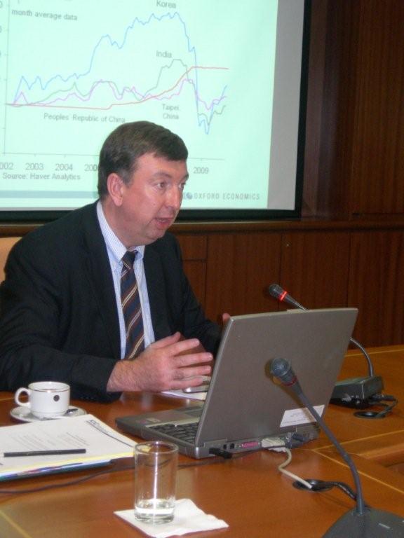 Adrian Cooper, CEO of Oxford Economics, spoke at a conference